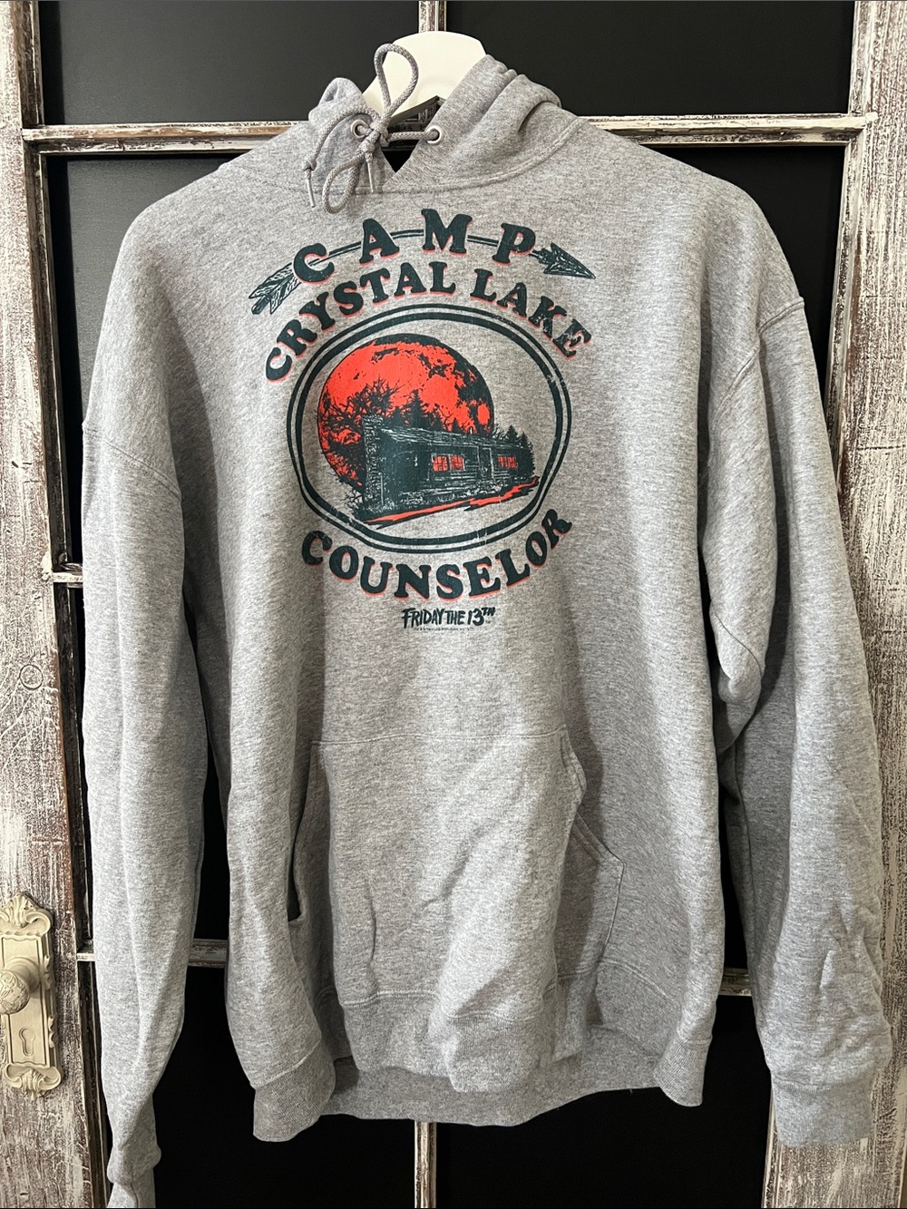 Camp Crystal Lake Counselor Graphic Hoodie - Gray and retro style shorts